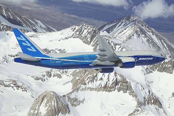 Boeing 777-200LR Worldliner flies over the Cascade Mountain Range in Washington State.(Neg#: K63367-05)
